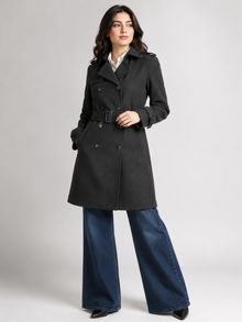 Black double-breasted belted coat for women - full length three-quarter view