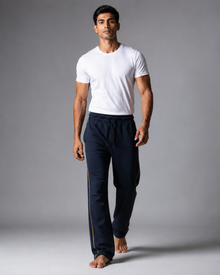 Men's navy blue track pant with gold piping front view