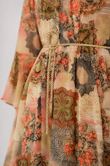 Gold rope belt and waist detail of MMASTER printed maxi dress
